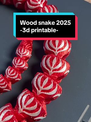 A post by @plastic3d on TikTok caption: Happy new year! 🥳  #3dprinting #plastic3d #snake #2025 