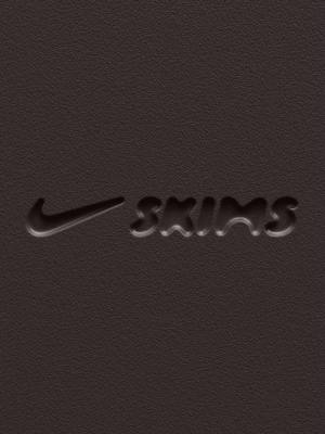 A post by @kimkardashian on TikTok caption: Introducing NikeSKIMS. A new brand coming this spring for the body obsessed. Designed to sculpt and engineered to perform.