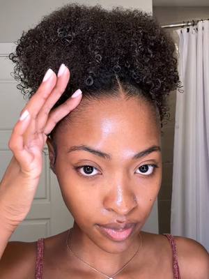 A post by @xoalyria on TikTok caption: My go to natural hairstyle 🫶🏾  Products:  @As I Am JBCO Water @Camille Rose Curl aide Grapeseed Oil @ECO gel Green eco @Shinenjam Red jam @Donna’s Recipe Curl gel and edge control  #Fyp #naturalhair #clawclip #naturalhairstyles #naturalhairtiktok #naturalhaircare 