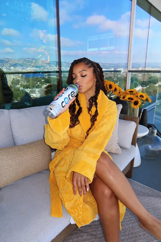A post by @chloebaileywashere on TikTok caption: #ad glowing from the inside out 🌻🌻🌻 and staying hydrated with @core , of course!💧 #StartAtTheCore #CoreHydration 