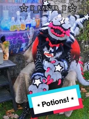 A post by @x_razzer_x on TikTok caption: 🔮✨Welcome to Crimsons Coven!✨🔮 - What can I brew for you today? 🐾 - #furry #halloweenmask #furryfandom #fursuitouting 