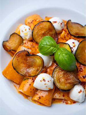 A post by @breadbakebeyond on TikTok caption: Sicilian-Style Rigatoni Eggplant, tomatoes, and mozzarella - some of my favorite ingredients in one dish. The lightly fried eggplant brings a rich, savory flavor that pairs perfectly with creamy mozzarella and a bold tomato sauce. Simple ingredients, big flavor, and the kind of pasta you’ll want to make again. #pastanight #italianamericanfood #weeknightdinner #Foodie #cheeselover #nycfoodie #laeats #fyppp  Eggplant pasta recipe  Tomato basil rigatoni Classic comfort food Easy pasta dinner