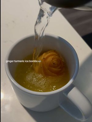 A post by @lexijxhnson on TikTok caption: Ginger turmeric immunity ice bombs ☕️ My two favorite remedies for when I’m sick put into one- tea and immunity shots. I’m drinking these now just to keep from getting sick. Everyone has been getting sick lately, so I thought it was a good time to post these! 🫖 1/4-ish lb of ginger 2” turmeric 3 oranges 1 lemon 1/2 tsp black pepper 1/4 tsp Cayenne pepper & I like to add honey, but the way the last little bit in my bottle tried to play me😭 It’s not the tastiest but it’s gone do the job!