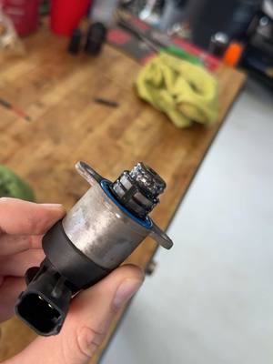 A post by @davesautocenter on TikTok caption: Diesel Fuel Filter change causes no start. What happened to cause this? #autoshop #carrepair #enginebuild #enginerepair #autorepair 