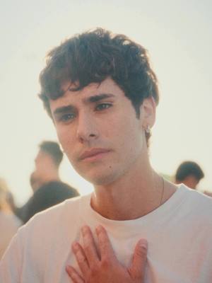 A post by @johnnyvalentineee on TikTok caption: Searching for the love of my life at the surf shop 🏄‍♂️👀❣️ #relationships #love #comedy #prank #funny #johnnyvalentine #romantic 
