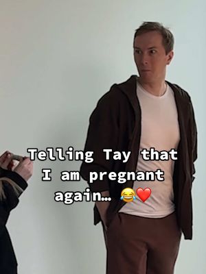 A post by @kayandtayofficial on TikTok caption: His reaction 🥹 I’m so excited to be starting this pregnancy journey with Tay! 🥹❤️ backstory ::: So as a few of you may know, i am pregnant again… 😂 and I’m so so so excited! I tested on my own in the bathroom and when the test said “pregnant”, I was so shocked and excited and all of the emotions! Then, I wanted to immeditaly tell tay! 😂 but I knew that i wanted to do it in a fun way, so i decided to go tell kinsley first. And she was so happy! Then i told my mom, and all three of us tried to figure out how to tell Tay but we couldnt think of anything! 😂 And i was so scared that i was going to ruin the surprise because I am horrible at keeping secrets, so i went to look for a toy bug to hide, so i could ask him to get it for me, and i would be behind him holding the test! But i couldn’t find those bugs anywhere! So i finally just hid a phone and called him up to the room, and this was the result! 😂 We are both so excited and shocked, and can’t wait to have this pregnancy journey and make ellie a big sister and meet our baby! 🥹 #kayandtayofficial #couples #relationships #pregnant  