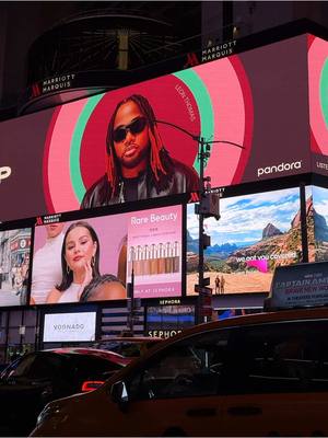 A post by @leonthomas on TikTok caption: Honored to be on @pandora ‘s marquee in Times Square during #BlackHistoryMonth. Grateful to represent our culture and music on this stage. Here’s to celebrating our legacy and inspiring the next generation ✊🏽