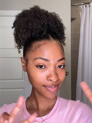 A post by @xoalyria on TikTok caption: Refresh my hair with me 🎀 #Fyp #naturalhair #clawclip #naturalhairstyles #naturalhairtiktok #naturalhaircare 