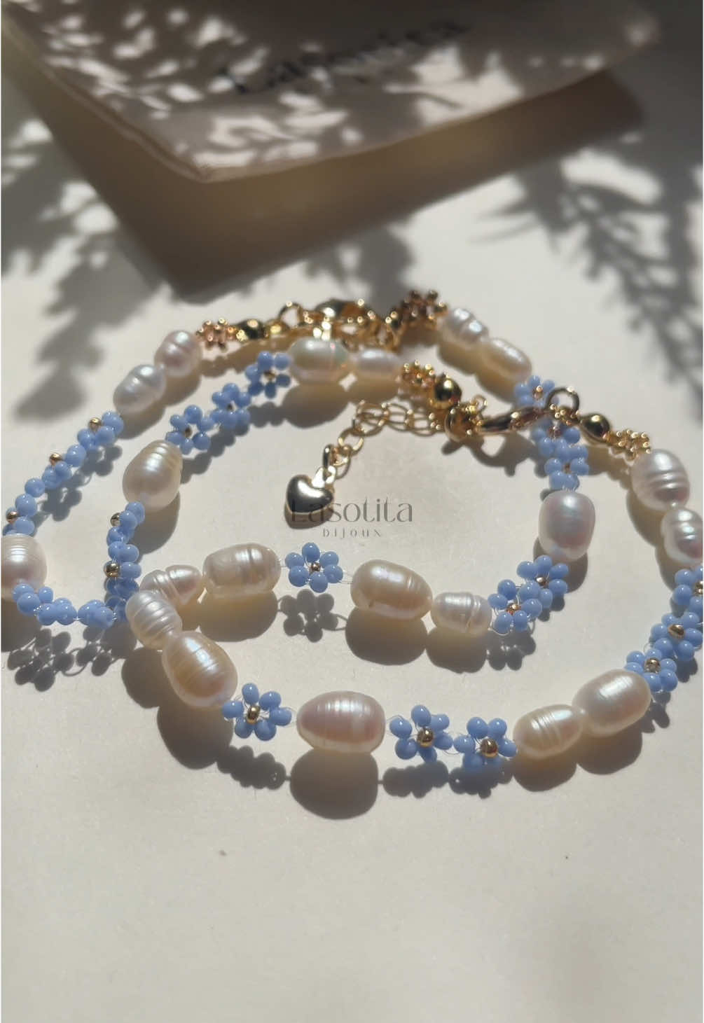 A post by @bijouxlasotita on TikTok caption: Our Aquamarine Bracelet >>> 🌊🐚🐬🩵 #SmallBusiness #handmadejewelry #handmadejewelrybusiness #womenownedbusiness #beadedjewelry #canadiansmallbusiness #beadedbracelets 