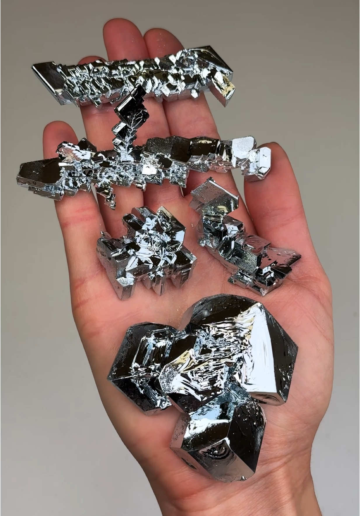 A post by @rocksforthespiritt on TikTok caption: Making Gallium Crystals!✨ Gallium is absolutely incredible as it turns from solid to liquid to crystal form so easily. You can literally see the geometric crystals form in front of your eyes! This experiment really shows the process of crystal formation and how this material organizes itself into a precise geometry. Although these crystals form in a short amount of time and are temporary, natural crystals form over a long period of time and are more permanent which makes us appreciate them even more!💎❤️