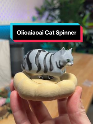 A post by @plastic3d on TikTok caption: 3d printable Oiioaoai Cat spinner 