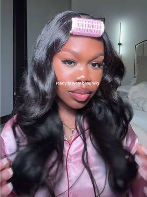 A post by @ebonyrosaa on TikTok caption: 24" glueless loose wave wig @UNICE HAIR OFFICIAL @UNice Hair  #unicebyebyeknotswig #byebyeknotswig #unicehair #knotlesswig #curtainbangs