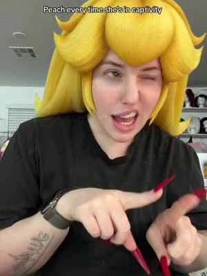 A post by @umbrawigs on TikTok caption: We all know she’s in to seeing bowser ,,, but for the sake of this video😭😭😭  . #wigcommission #wigmaker #wigstyling #peach #princesspeach #peachwig #princesspeachwig #cosplaywigs #nintendo 