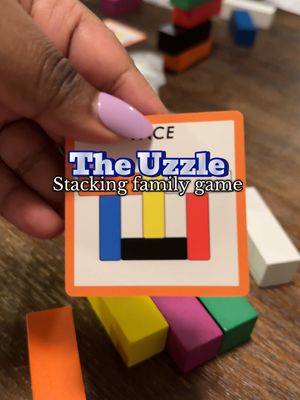 A post by @breecoolmom on TikTok caption: This family stacking game is a favorite board game for all ages #uzzle #boardgames #boardgame #games 