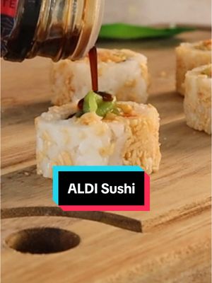 A post by @by_the_water on TikTok caption: I Tried Sushi from ALDI #seafood #sushi #aldi 