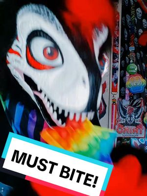 A post by @x_razzer_x on TikTok caption: Just gotta bite everything >:) - #furry #fidgeytoy #furryfandom 