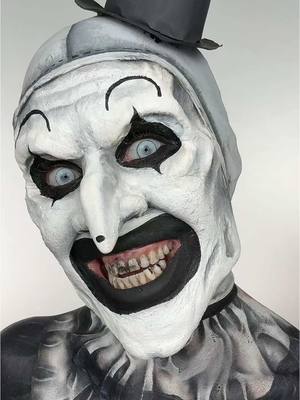 A post by @hollymurraymakeup on TikTok caption: The Terrifier 😱 Art The Clown inspired makeup! Who should I create next?! 