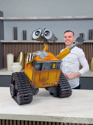 A post by @amauryguichon on TikTok caption: Chocolate WALL-E! 🚀💫 The cutest little robot reaching for the stars. #amauryguichon #chocolate 