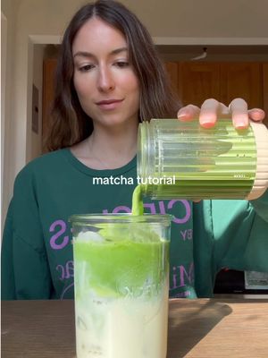 A post by @glowwithella on TikTok caption: matcha two ways 🍵 using my favorite ever matcha @cosmiccultures (discount is ELLA10) 🔥HOT — aka coconut matcha Ingredients: - 1 cup coconut milk  - 1 tbsp coconut oil or butter  - 2 tsp organic ceremonial matcha powder - 1 tsp vanilla extract (measure w ur heart cmon) - 2 tsp raw honey or maple syrup  - 1 scoop collagen powder (I use carnivore arealius code ella39677) - pinch of real salt  - hot filtered water (~175 degrees F) Recipe: 1. Heat up coconut milk on a stovetop, continuously stirring till hot and simmering (~175 degrees F) 2. Blend together hot coconut milk, collagen, coconut oil, matcha, vanilla, honey or maple and salt until smooth  3. Pour blended mixture into mug, and top off with hot water, ENJOY  🧊ICED — aka the OG  Notes: To make this frothy see below recipe Ingredients  - 1 cup A2 raw or lowpasturized non homogenized organic & grass fed milk  - 2 tsp organic ceremonial matcha powder - 1 tsp vanilla extract or vanilla bean (measure w ur heart cmon) - 2 tsp raw honey or maple syrup  - pinch of real salt  - 1/4 cup filtered water  - lots of ice  Recipe (normal — see frothy instructions below): 1. Blend together matcha, vanilla, honey, salt and water in a blender 2. In a large jar, add tons of ice and milk  3. Pour over blended matcha — voila!!!!!  FROTHY: - Add ins: scoop of collagen, optional egg yolk  1. Blend together milk, collagen, vanilla, honey or maple, salt, optional egg yolk and water in a blender 2. Pour over ice in a large jar 3. Using the same blender, blend together water and matcha — pour over frothy milk 4. ENJOY!