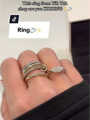 A post by @sydneyy_nicole on TikTok caption: Couldn’t decide between gold or white gold… I think I need both #marquise #marquisering #moissanite #cocktailring #eastwestring #engagementring #ringtok #ringstack 