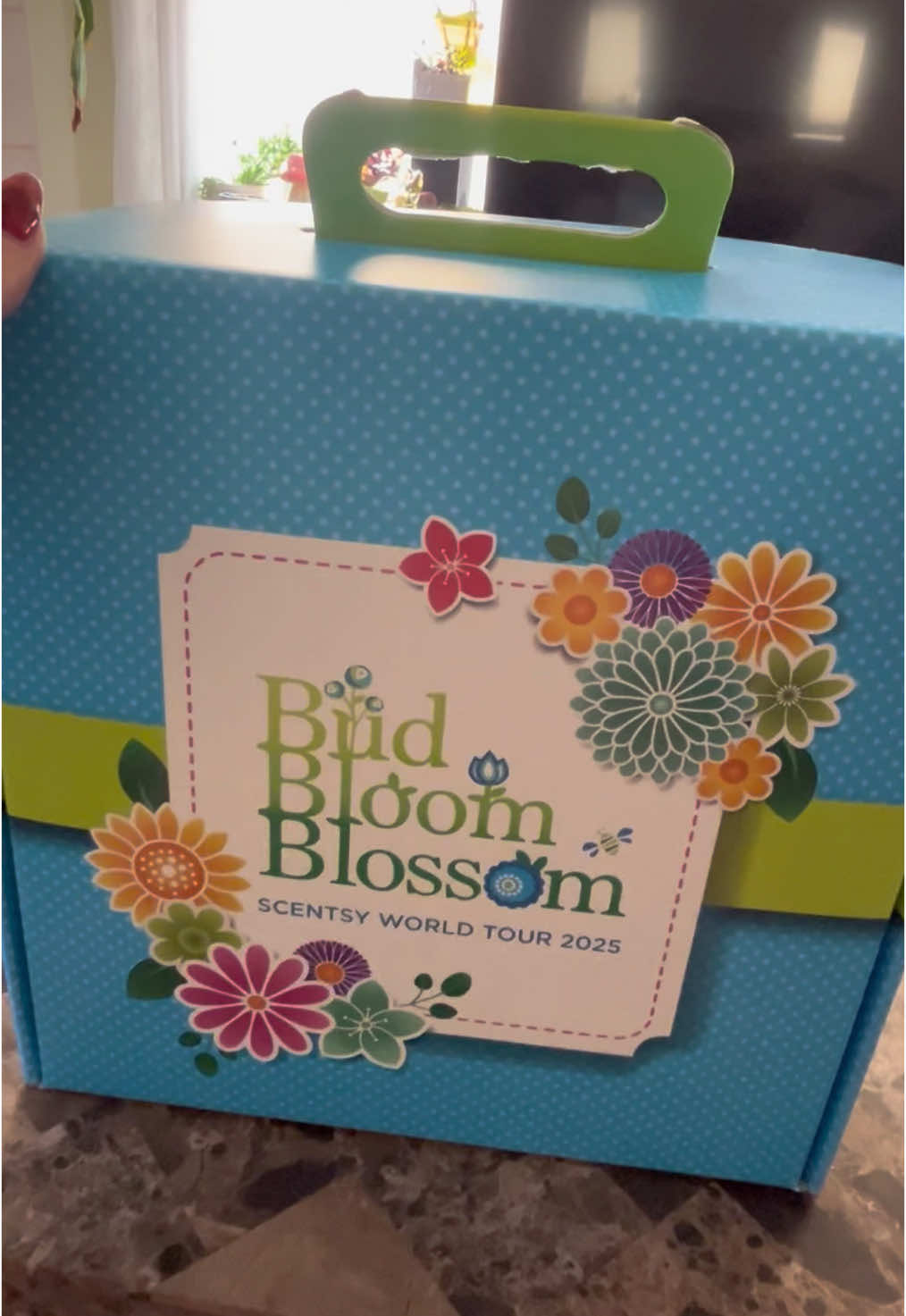 A post by @chers_scent_spot on TikTok caption: Let’s dig into my Bloom box I received from my World Tour conference with Scentsy this weekend . It’s Filled with new goodies coming March 1st and a beautiful XL fragrance flower made especially for us at the event!! #ScentsyWorldTour2025 #scentsylife #bloombox #scentsy #springcatalog #myfavoriteproducts