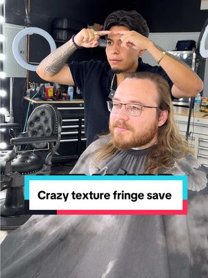 A post by @j_da_barberr on TikTok caption: Insane texture fringe haircut my client was receding and made him look tired and mad so I he came to the best barber in Chicago to get a whole new haircut transformation and I get him a low taper blowout texture fringe haircut transformation he was amazed  Link in bio to book an appointment 💈 #chicagobarber #j_da_barberr #chicago #chicagobarbers #berwyn #berwynbarber #lowtaperfringe #transformation #fyp #savinghim 