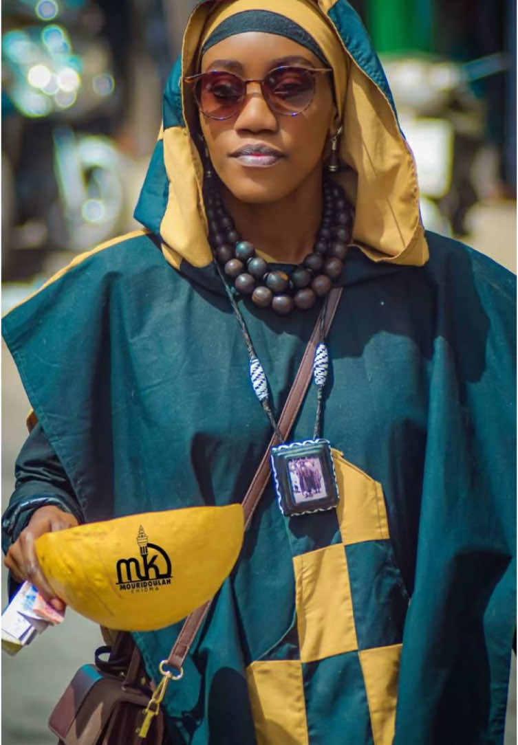 A post by @adjimourtada31031998 on TikTok caption: Thi Dame kepp 🤎🖤 @Mouridoulah Khidma Officiel 