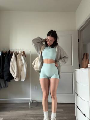 A post by @anisiafromsprouts on TikTok caption: vibes are so good for todays glute day @DFYNE| code ANISIA 🎧 #grwm #GymTok #gymfit #fyp 