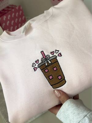 A post by @noelicreates on TikTok caption: ✨ASMR✨ make a coquette iced coffee crewneck 🎀 launching this Friday February 28th 6 PM PST 