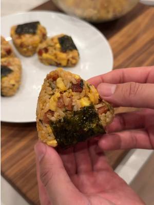 A post by @newt on TikTok caption: Spam + Eggs + Rice = Goated Combo 😮‍💨🔥 just like Steph, Klay, and me