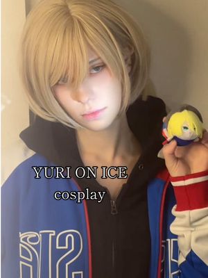 A post by @iwant9nuggets on TikTok caption: the greatest*🙂‍↕️🩵#yurionice#yurionicecosplay #yuriplisetsky#yurio #yuriocosplay #agape #yurioagape  #yuriplisetskycosplay #ユリオコスプレ #ユーリオンアイス#ユーリオンアイスコスプレ#ユーリonice #cos #cosplay