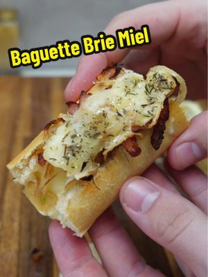 A post by @seizemay on TikTok caption: Baguette Brie Miel ! 🍯🥖 #recette #recettefacile #recetterapide #baguette #cuisine #cuisinefacile