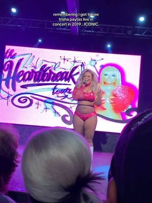 A post by @theashleygreenlee on TikTok caption: “i wanna say hi to rick moranis!” IFYKYK 🤭 @trishapaytas #trishapaytas #icon #youtuber #og #queen #fangirl #throwback #concert 