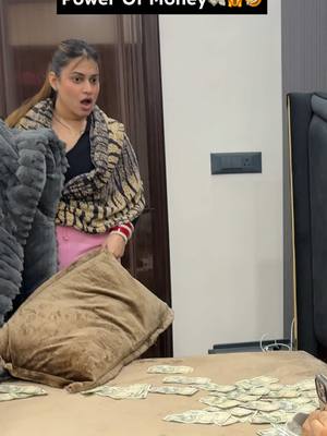 A post by @rajatbornstar on TikTok caption: Power of Money 🤣😂 #couplethings #funnycouple #relatable #tiktokviral #rajatbornstar #rajatswati #funny #TrueLove #couplegoal #comedy 