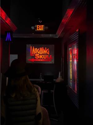 A post by @ayannaalexiss on TikTok caption: Highly recommend “the laughing skull lounge” in Atlanta! It’s located inside of the Vortex! Such a fun activity to do on a night out! They have a full service bar and you can eat food at the Vortex before the show… the burgers are insane!!😌#CapCut 