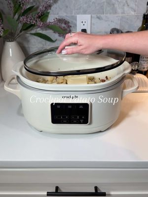 A post by @kellie_atkinson on TikTok caption: Crockpot potato soup 🤤 Combine: 2 pounds potatoes 1 small yellow onion  4 oz bacon 2 cups chicken broth  5 tbsp butter Cook on high 2-3 hours or low 6-8 hours Stir in: 1 cup sour cream 1/3 cup heavy cream 2 cups cheddar cheese Top with: Bacon, cheese, & chives Ib: @Stormi  #slowcooker #potatosoup #crockpot #crockpotrecipe #EasyRecipe #weeknightdinner #easydinner #slowcookerrecipe #soup 