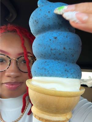 A post by @kie_eats on TikTok caption: Trying @Dairy Queen Crunchin’ Cookie Dipped Cone 🍦 💙 🩵 dairy queen cones #dippedcone #icecream #crunchy #asmr #mukbang #dairyqueen #dairyqueenmukbang dairy queen dipped cones