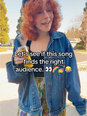 A post by @sarabethliebe on TikTok caption: Might just come out with a new song soon… 👀 See what I did there? 😂 What do we think about this one?  #IndieMusic #singersongwriter #🌈 #lgbtq #bi #fy #exploremore #NewMusic 