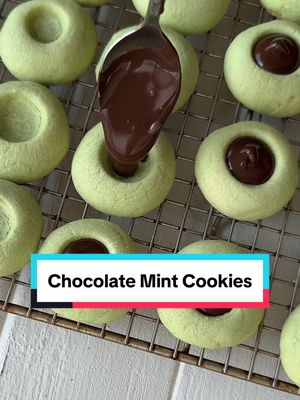 A post by @poshinprogress on TikTok caption: New on poshinprogress.com, I’m sharing a chocolate mint thumbprints recipe which is perfect for St. Patrick’s day or during the holidays. Tap the link in profile to check out the complete recipe. #mintchocolatechip #stpatricksday #stpatricksdayrecipes 