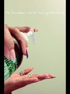 A post by @niaa321 on TikTok caption: Grandma knew best! Castor oil = the ultimate hair growth hack. ✨ @RejuveNaturals #HairGrowthSecrets #GrandmasRemedies #CastorOilMagic 