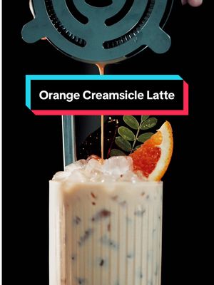 A post by @morgandrinkscoffee on TikTok caption: ORANGE CREAMSICLE LATTE // Find me chugging at least two of these a day in the summer, full recipe is up on the blog #barista #coffee 