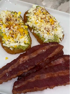 A post by @cookinwithjai on TikTok caption: Turkey bacon avocado toast hashbrown with shredded boiled eggs #fyp #breakfast #avocado #fypシ #breakfastideas 