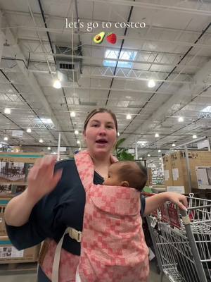 A post by @mamakarlsss on TikTok caption: two kids asleep at Costco???? such a good trip 😭