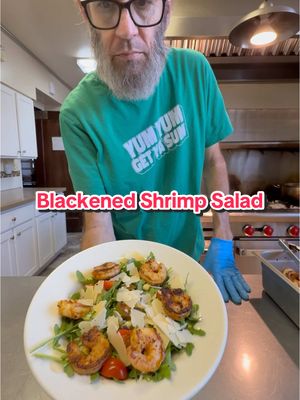 A post by @oldscoolkevmo on TikTok caption: Blackened Shrimp Salad #oldscoolkevmo #sororitychef #piphichef #nevadawolfpack #myway #arugula #vinaigrette 