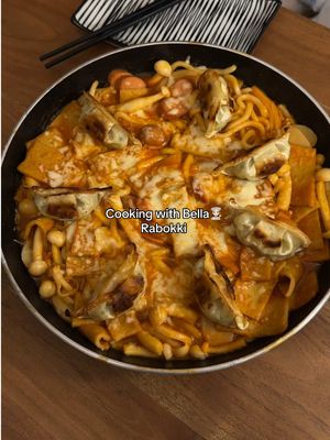 A post by @apj.bella on TikTok caption: My friends Rabokki recipe is ADDICTING Not a cook but living alone and trying to become my own private chef 👩🏻‍🍳 #EasyRecipes#cooking#koreanfood  