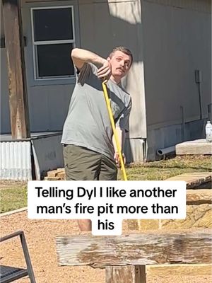 A post by @shelbanddyl on TikTok caption: His face when he kicked it 🤣 #shelbanddyl #firepit #DIY #couples #relationships 