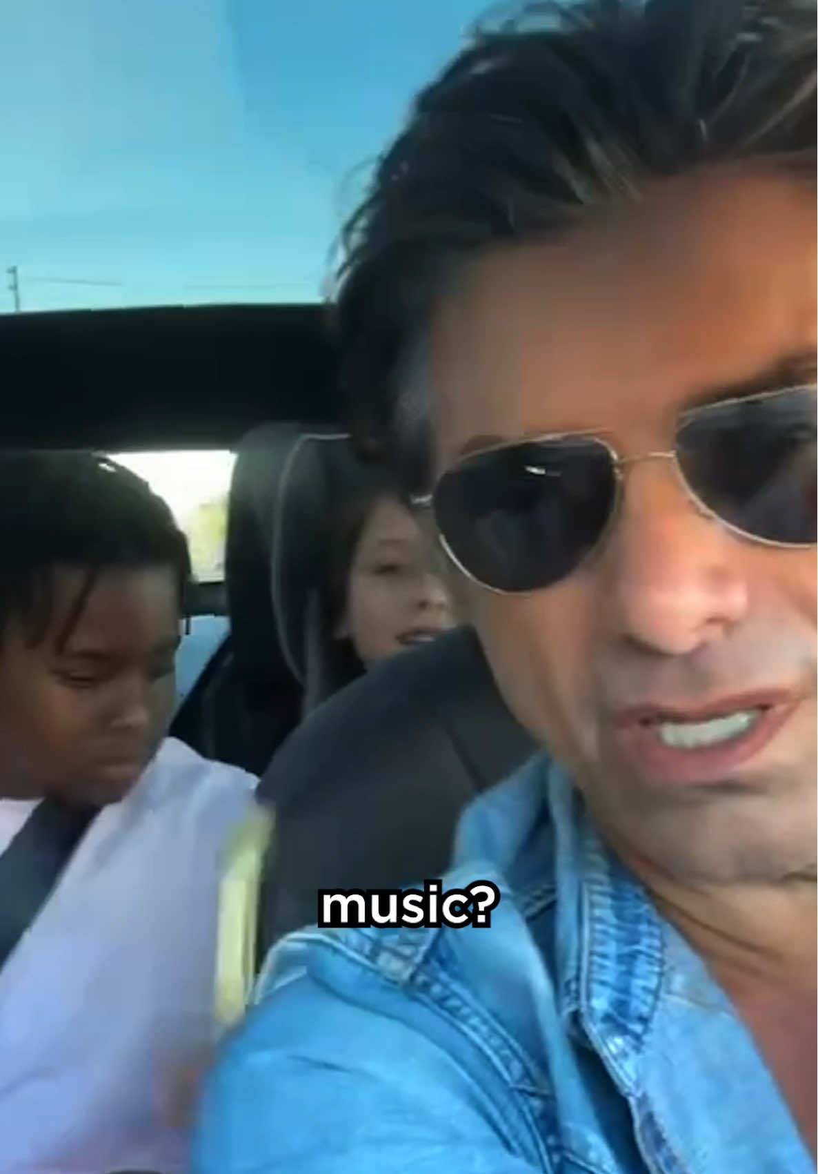 A post by @johnstamos on TikTok caption: Maybe the bus has a better DJ?