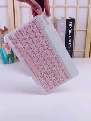 A post by @pet429 on TikTok caption: A great partner for tablet and mobile phone office!#CapCut #Plush #Retro #keyboard