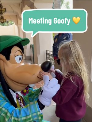 A post by @disneyparks on TikTok caption: A hug is worth a thousand ah-hyucks! 🤗 (via @Shelby Towe) #DisneyParks #Disneyland #Goofy