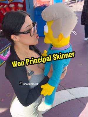 A post by @tinaexplorez on TikTok caption: Yayyy!!!!!!! Finally won Principal Skinner! @Tina #fyp #viral #OOTD #fypシ #basketball🏀 #universalstudioshollywood #universalstudioshollywood #balloons 